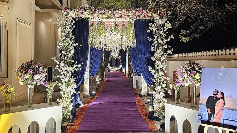 Image of a beautifully decorated entrance for a wedding ceremony at the ballroom & banquet hall.